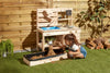 kids playing with Wooden Mud Kitchen and sand